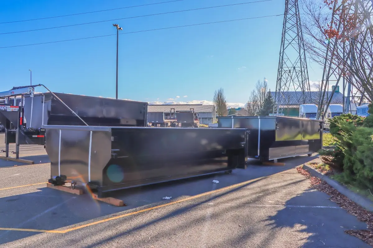Roll-off dumpster ready for waste disposal at job site for Demolition Dumpster Rental in East Coventry